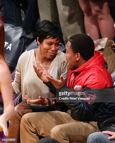 Regina King and her son Ian Alexander Jr. Attend a basketball game between the New Orleans Hornets and the Los Angeles Lakers at Staples Center on...