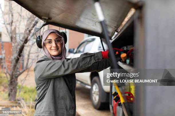 real life female tradie working in her own landscaping business - respect woman stock pictures, royalty-free photos & images