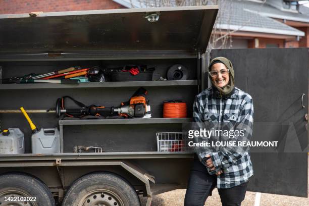 to camera portrait of a real life female tradie - tradie stock pictures, royalty-free photos & images