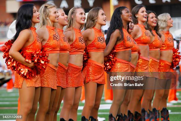 The Oklahoma State Cowboys pom squad gathers together before a game against the Central Michigan Chippewas at Boone Pickens Stadium on September 1,...