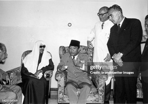 Saudi Arabian King Saud ibn Abd al-Aziz and the Indonesian President Sukarno with Professor Karl Fellinger and the Vienna police chief Josef Holaubek...