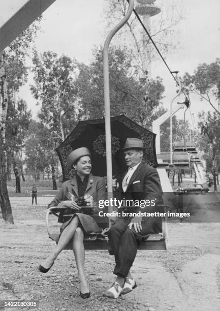 Nadja Tiller and Heinz Conrads at the presentation of the chairlift in the Donaupark . 28 August 1963.