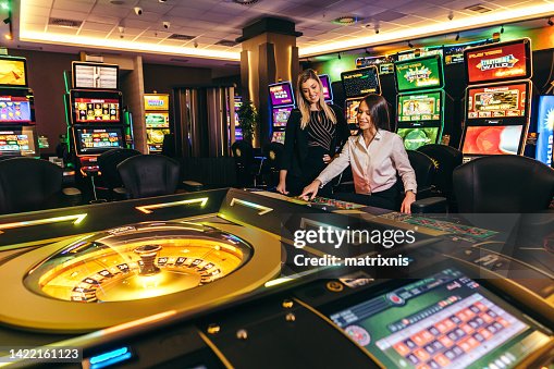 Two girls gambling, lucky win Two girls gambling, lucky win