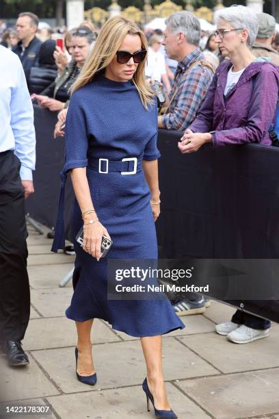 Amanda Holden paying her respects at the gates of Buckingham Palace on September 09, 2022 in London, England. Elizabeth Alexandra Mary Windsor was...
