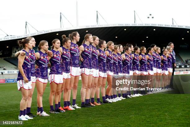 Fremantle players line up before the round three AFLW match between the Western Bulldogs and the Fremantle Dockers at Ikon Park on September 09, 2022...