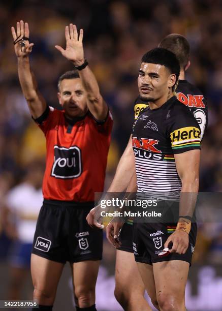 Taylan May of the Panthers is sent to the sin-bin by referee Gerard Sutton during the NRL Qualifying Final match between the Penrith Panthers and the...