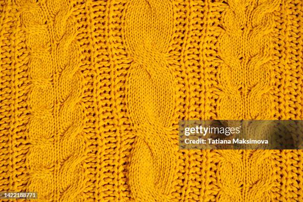 full frame shot of knitted sweater. cozy background. - shawl collar stock-fotos und bilder