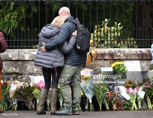 Mourners lay flowers outside Balmoral Castle on September 09, 2022 in Aberdeen, Scotland. Elizabeth Alexandra Mary Windsor was born in Bruton Street,...