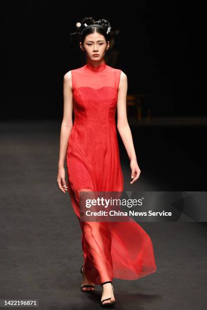 Model showcases designs on the runway at HEYUFANG show by designer Daiyu Zhang on day 5 of China Fashion Week 2023 S/S at 751D.PARK on September 8,...