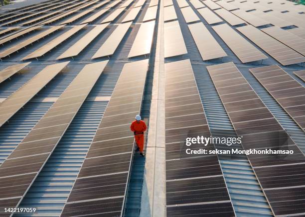 solar power plant,electrician working on checking and maintenance equipment - oberteil stock-fotos und bilder
