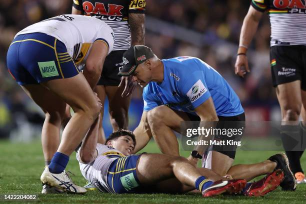 Mitchell Moses of the Eels is attended to by trainers after a tackle during the NRL Qualifying Final match between the Penrith Panthers and the...