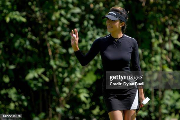 Muni He of China reacts after making birdie on the 12th green during the first round of the Kroger Queen City Championship presented by P&G at...