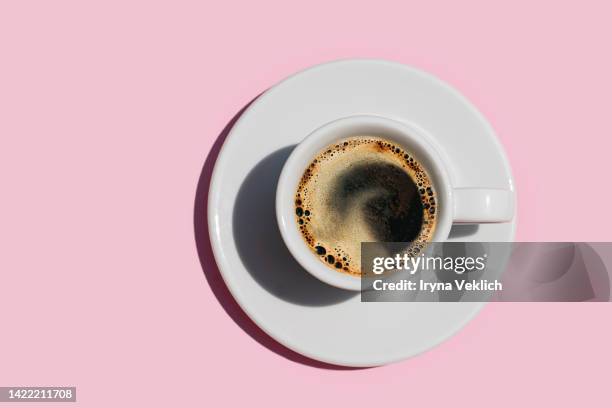 directly above shot of coffee on pink color background. - bar imagens e fotografias de stock