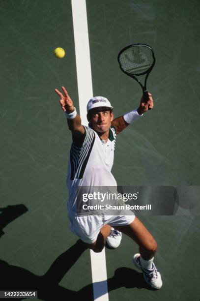 Guy Forget from France keeps his eyes on the tennis ball as he serves against Félix Mantilla of Spain during their Men's Singles Second Round match...