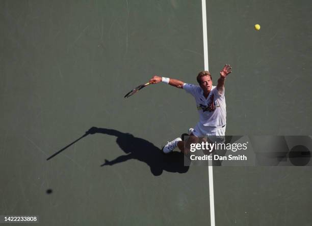 Stefan Edberg from Sweden keeps his eyes on the tennis ball as he serves against Jeff Tarango of the United States during their Men's Singles Second...