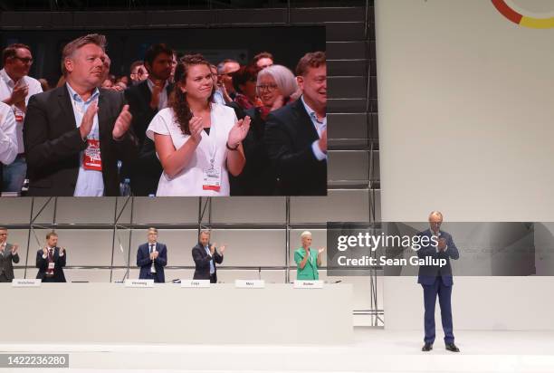 Friedrich Merz , leader of the German Christian Democrats , receives a standing applause after he spoke on the first day of a two-day CDU federal...