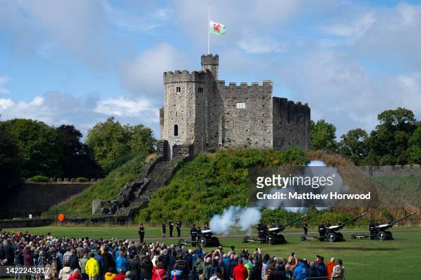The 104 Regiment Royal Artillery take part in the 96-gun salute, to mark every year of the Queen's life, at Cardiff Castle on September 9, 2022 in...