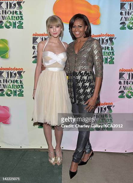 Singer Taylor Swift and First Lady Michelle Obama at Nickelodeon's 25th Annual Kids' Choice Awards held at Galen Center on March 31, 2012 in Los...