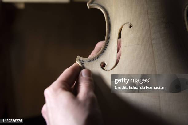 The birth of a violin in the Scrollavezza Zanré Noventa violin making workshop in Parma.