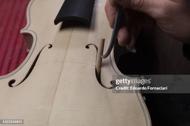 The birth of a violin in the Scrollavezza Zanré Noventa violin making workshop in Parma.