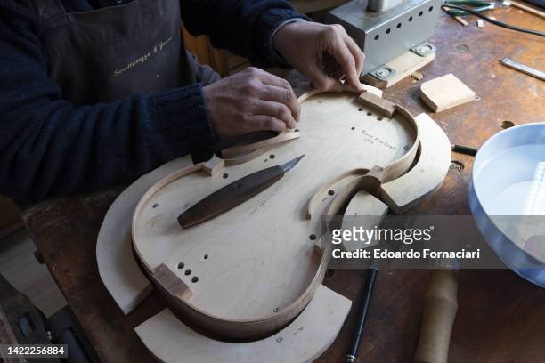 The birth of a violin in the Scrollavezza Zanré Noventa violin making workshop in Parma.