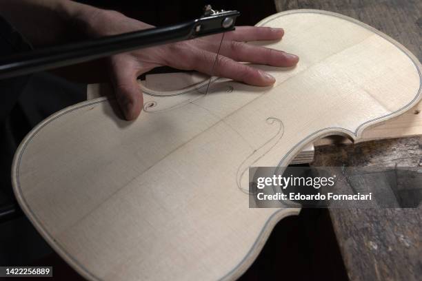 The birth of a violin in the Scrollavezza Zanré Noventa violin making workshop in Parma.