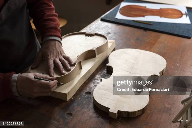 The birth of a violin in the Scrollavezza Zanré Noventa violin making workshop in Parma.