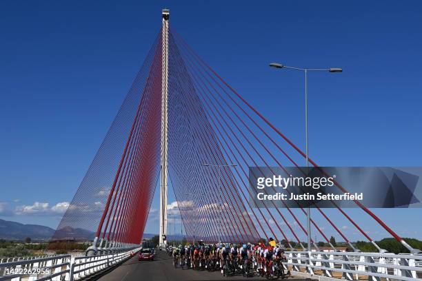 General view of the peloton passing through the Bridge Puente de Castilla-La Mancha during the 77th Tour of Spain 2022, Stage 19 a 138,3km stage from...
