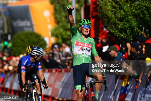 Mads Pedersen of Denmark and Team Trek - Segafredo - Green Points Jersey celebrates at finish line as stage winner ahead of Fred Wright of United...