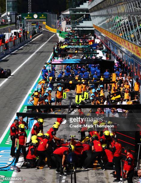 The Ferrari team work in the Pitlane during practice ahead of the F1 Grand Prix of Italy at Autodromo Nazionale Monza on September 09, 2022 in Monza,...