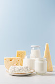 Variety of dairy products on blue background