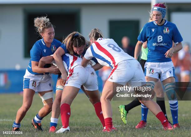 Caroline Drouin of France is tackled by Veronica Madia and Francesca Sgorbini of Italy during the Summer Nations Series Test Match 2022 between Italy...
