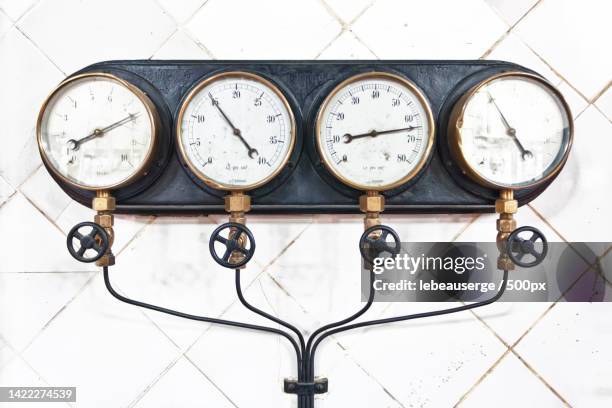 directly above shot of clock on tiled floor,spain - a picture of a barometer foto e immagini stock