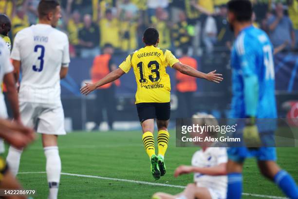 Raphael Guerreiro of Borussia Dortmund celebrates their team's second goal during the UEFA Champions League group G match between Borussia Dortmund...