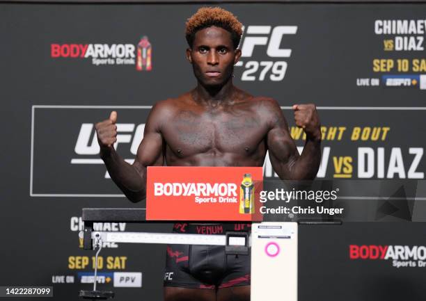 Hakeem Dawodu of Canada poses on the scale during the UFC 279 official weigh-in at UFC APEX on September 09, 2022 in Las Vegas, Nevada.