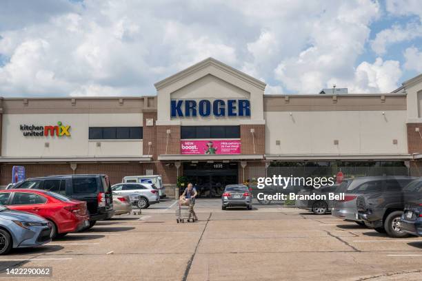 Customer exits a Kroger grocery store on September 09, 2022 in Houston, Texas. Kroger stock increased six percent as the company surpassed profit and...