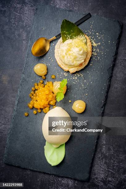 lemon flavoured dessert - empty yellow plate from above stock pictures, royalty-free photos & images