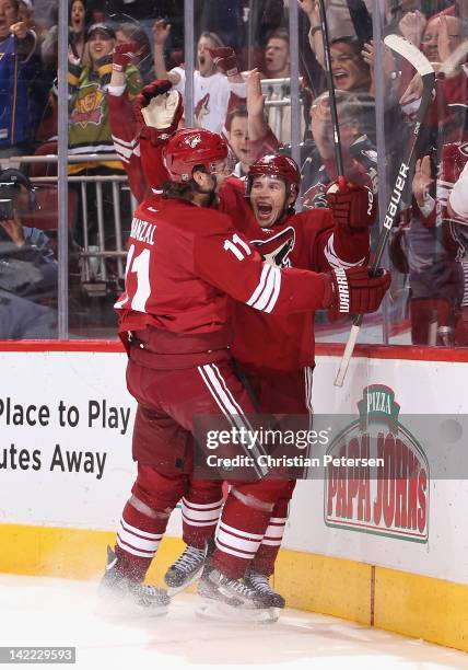 Ray Whitney of the Phoenix Coyotes celebrates with Martin Hanzal after scoring a second-period power-play goal against the Anaheim Ducks during the...