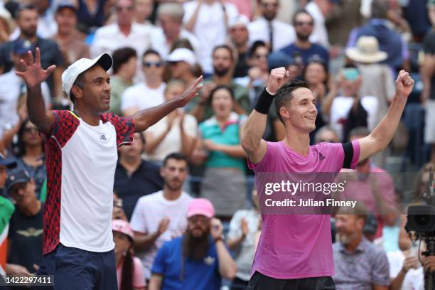 Rajeev Ram of the United States and Joe Salisbury of Great Britain celebrate after defeating Neal Skupski of Great Britain and Wesley Koolhof of the...