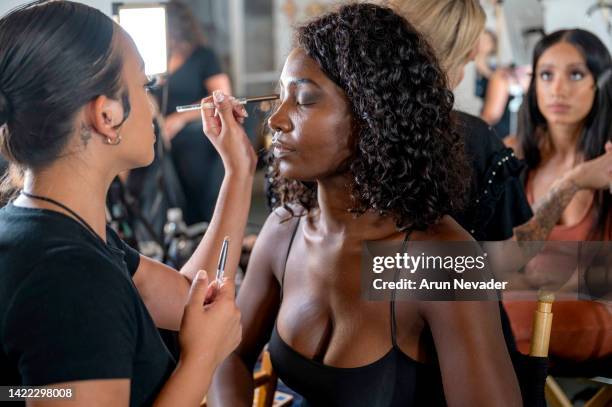 Model prepares backstage at New York Fashion Week Powered By Art Hearts Fashion September 2022 at The Angel Orensanz Foundation on September 08, 2022...