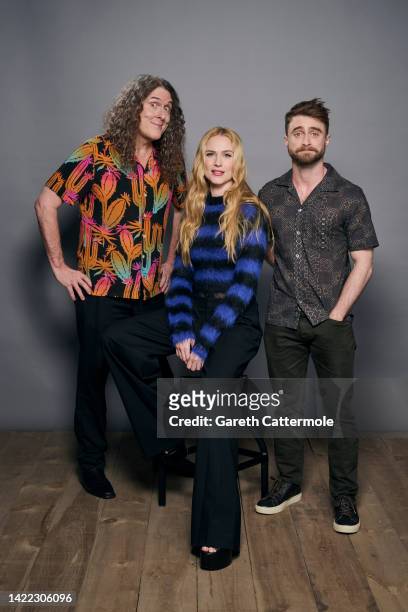 Weird Al" Yankovic, Evan Rachel Wood, and Daniel Radcliffe of "Weird: The Al Yankovic Story" pose in the Getty Images Portrait Studio Presented by...