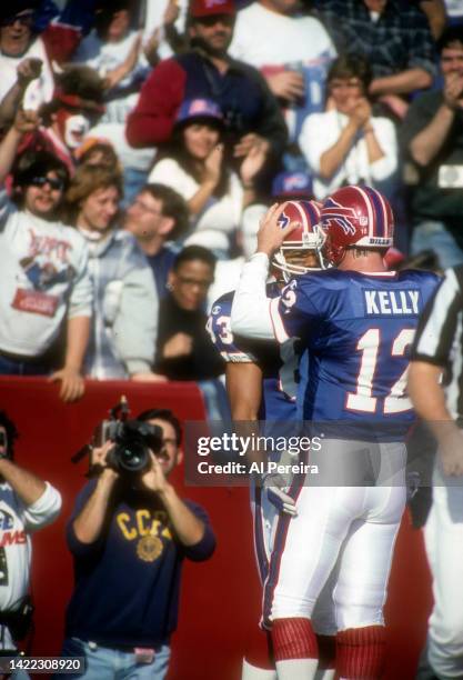 Wide Receiver Andre Reed of the Buffalo Bills scores a Touchdown in the game between The Kansas City Chiefs vs The Buffalo Bills at Rich Stadium on...