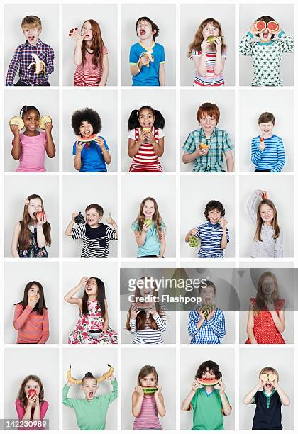 group of children eating fruit - healthy eating white background stock pictures, royalty-free photos & images