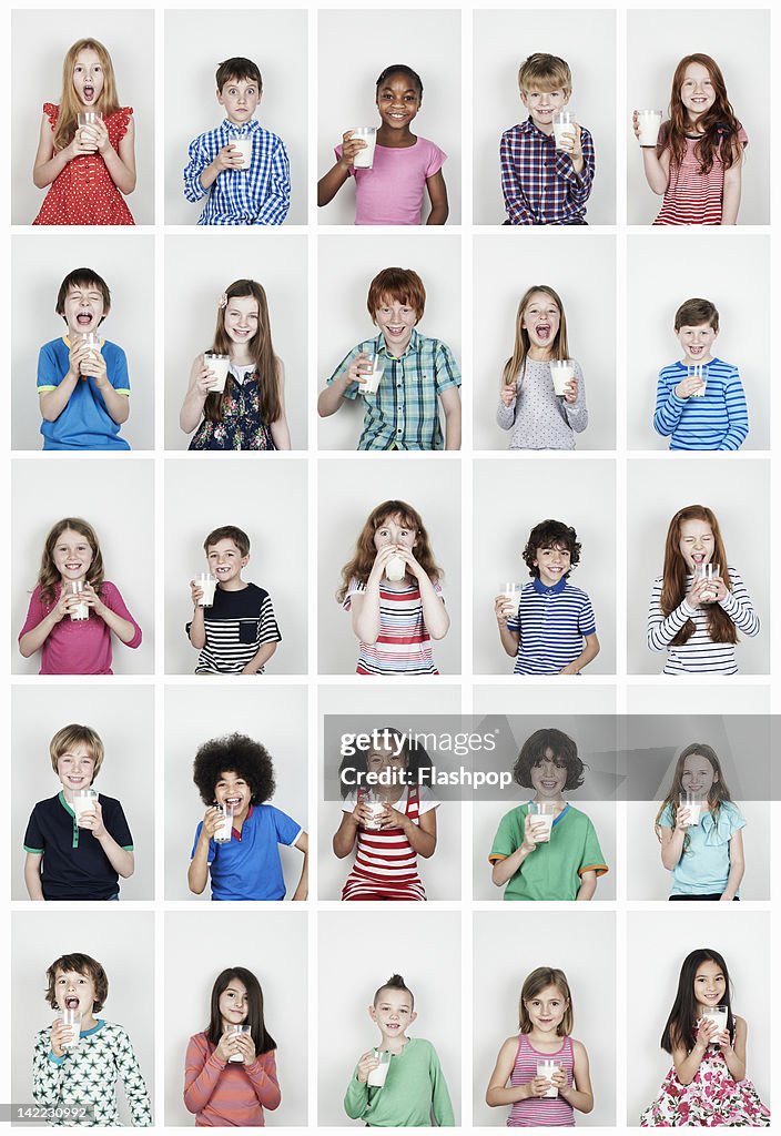 Group of children drinking a glass of milk