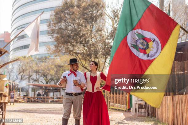 gaucho couple drinking chimarrao at the farroupilha camp - rio grande bildbanksfoton och bilder