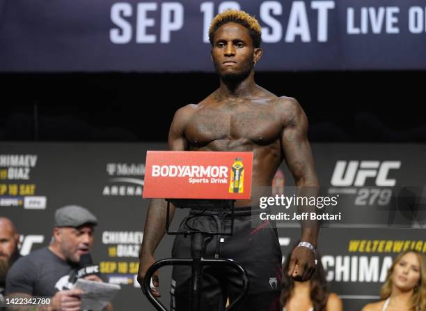 Hakeem Dawodu of Canada poses on the scale during the UFC 279 ceremonial weigh-in at MGM Grand Garden Arena on September 09, 2022 in Las Vegas,...