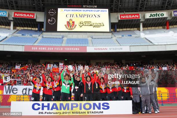 Nagoya Grampus players and staffs celebrate following the Fuji Xerox Super Cup between Nagoya Grampus and Kashima Antlers at Nissan Stadium on...