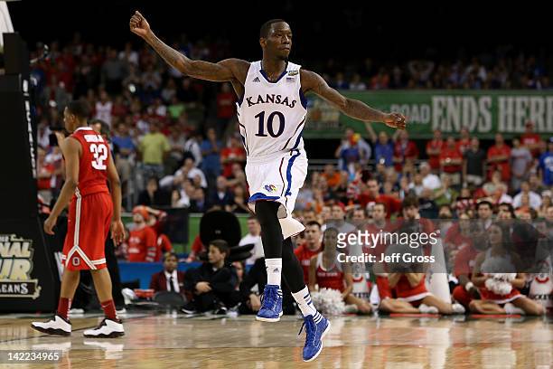 Tyshawn Taylor of the Kansas Jayhawks reacts as the Jayhawks defeat the Ohio State Buckeyes 64-62 during the National Semifinal game of the 2012 NCAA...
