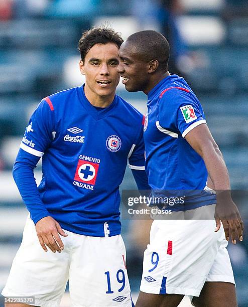 Omar Bravo and Edixon Perea of Cruz Azul celebrate a goal during a match between Cruz Azul v San Luis as part of Torneo Clausura 2012 at Azul Stadium...