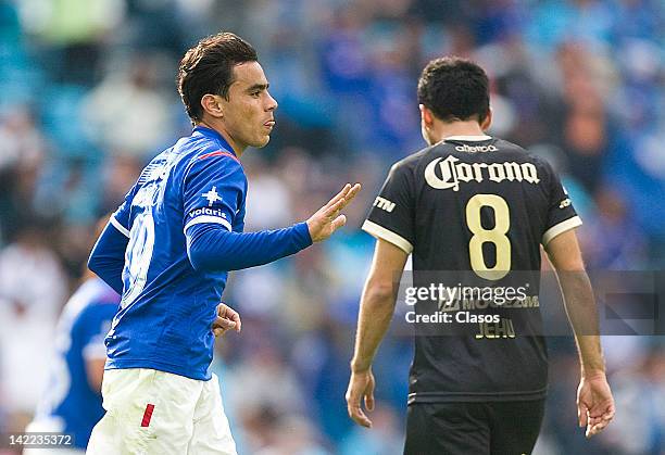 Omar Bravo of Cruz Azul and Jehu Chiapas of San Luis in action during a match between Cruz Azul v San Luis as part of Torneo Clausura 2012 at Azul...